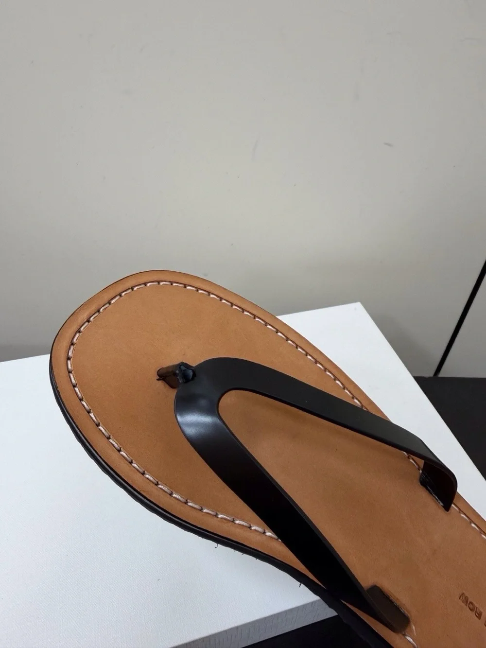 Women’s Tan Leather Flip-Flop Sandals with Black Straps
